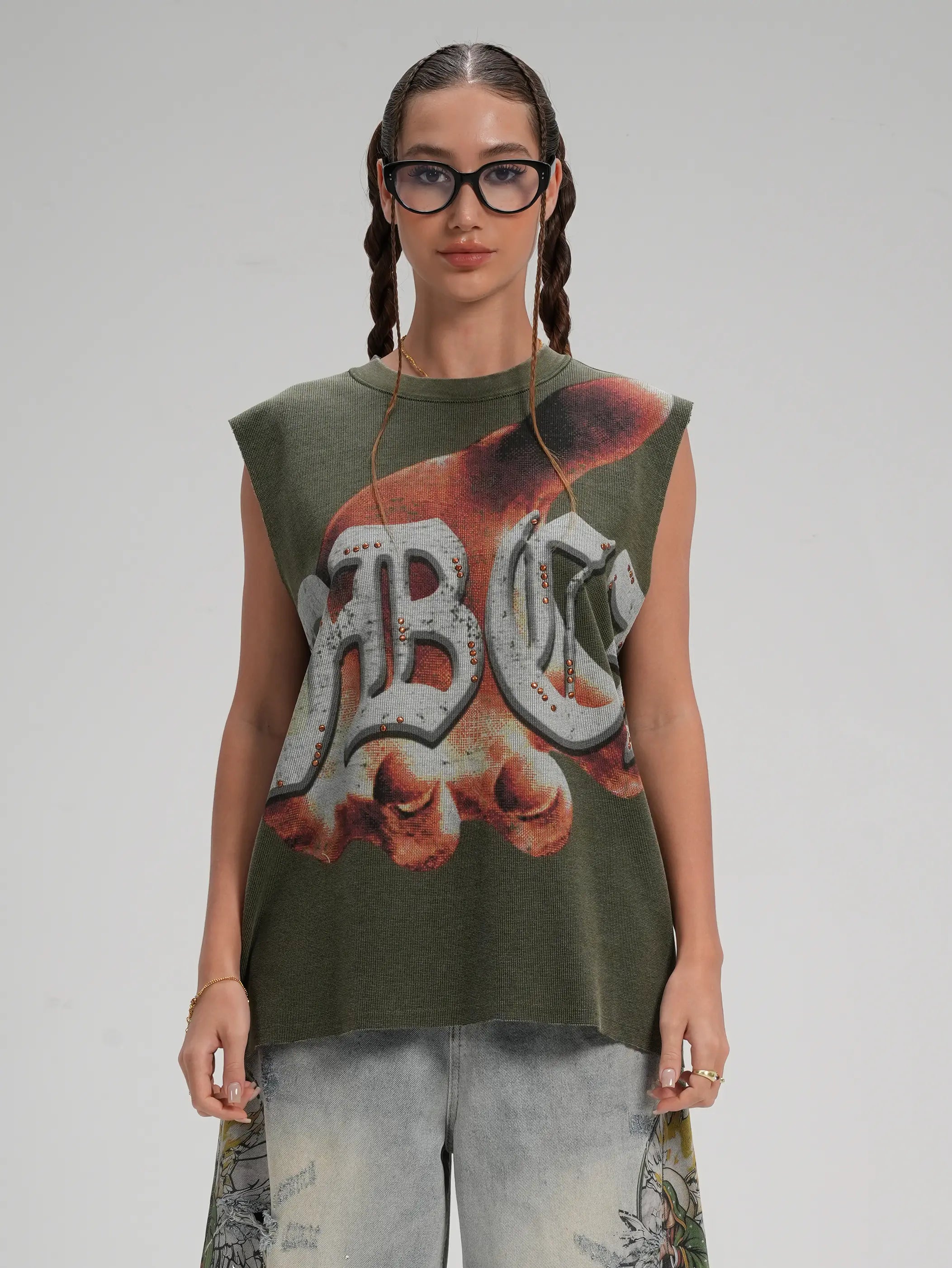 Camiseta sin mangas con tachuelas estilo punk con dobladillo sin rematar-575