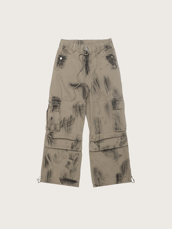 Stylish Cargo Pants in Beige with Unique Brushstroke Print Detailing Adjustable Drawstring Hems