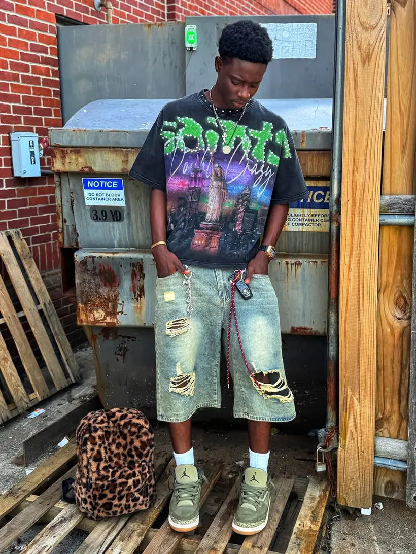 ripped denim shorts, sneakers, street accessories